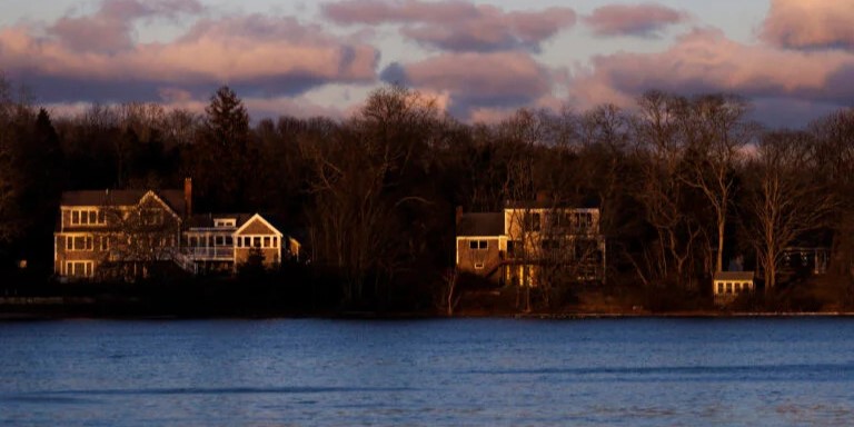 A cropped version of the Falmouth Enterprise logo over a map of Cape Cod with the Upper Cape towns of Falmouth, Bourne, Mashpee, and Sandwich highlighted